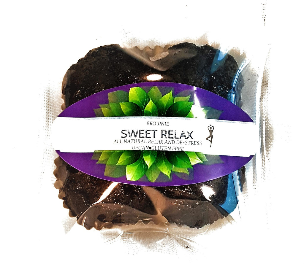 Brown Chocolate  Brownie in Wrapper with Green Leaf and Purple Background with Woman Four Brownies